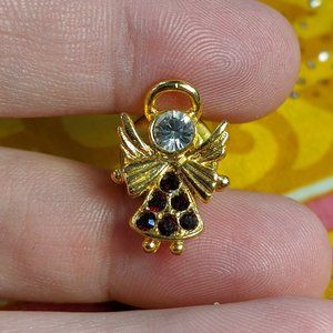 Vintage small angel pin with ruby red rhinestones